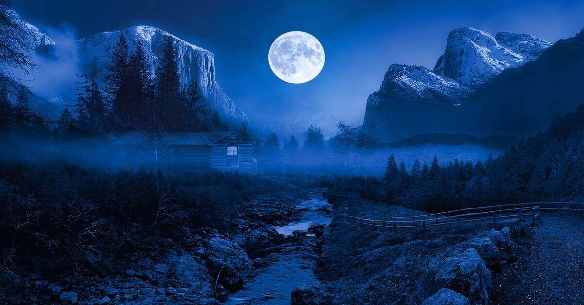 Landscape with full moon in the background