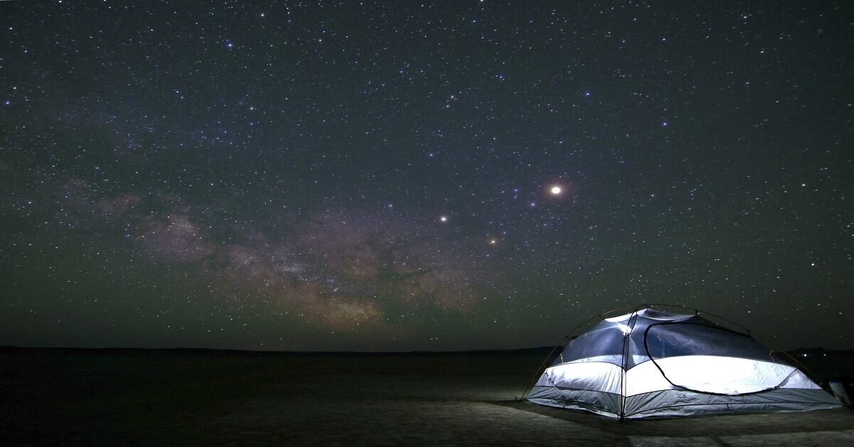 Lit tent at night